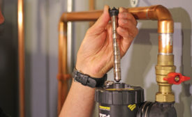 Fernox’s TF1 Total Filter uses a magnet to attract metal fragments and keep them from circulating within hydronics systems.