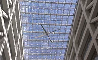 High-volume, low-speed (HVLS) fans create a light 2-3 mph breeze that produces an evaporative cooling effect and reduces the effective temperature by 7°-11°F, leading to significant energy savings in high-performance buildings.