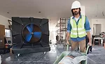 In a manufactured evaporative cooler, a water pump assists in creating the evaporative effect and a fan distributes the cool air.