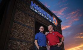 Wade Hamstra (left) and his dad, Jeff Hamstra (right), are the third- and second-generation owners of Tucson, Arizona-based Hamstra Heating & Cooling Inc.