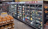 POPULAR AISLE Supermarket customers don’t care what HVACR contractors have to go through to keep their favorite beverages cold – they just expect the work to be done. Photo courtesy of Zero Zone, Inc.