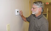 SET IT RIGHT Smart thermostats are catching on with all demographics. Photo courtesy of Fort Rucker; http://bit.ly/EFFICIENT1