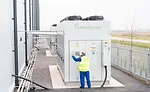 Low-charge, packaged ammonia systems