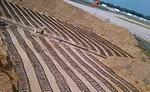 Installation of a geothermal loop field