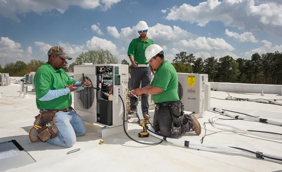 Eco Green Air employees install