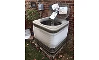 Air Source Heat Pump An air-source heat pump with a severely frosted outdoor evaporator coil. - ACHR