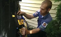 Bryan Jones, an installer at Fire and Ice Heating and Air Conditioning, Columbus, Ohio, ensures the charge is correct. - ACHR