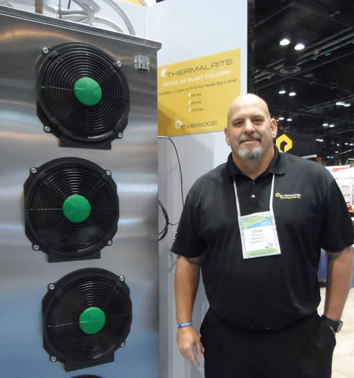 EVERIDGE: Steve Gill, senior vice president of sales and marketingfoodservice at Everidge, showed how a new modular blast chiller blows air to the side instead of on the food. - ACHR News