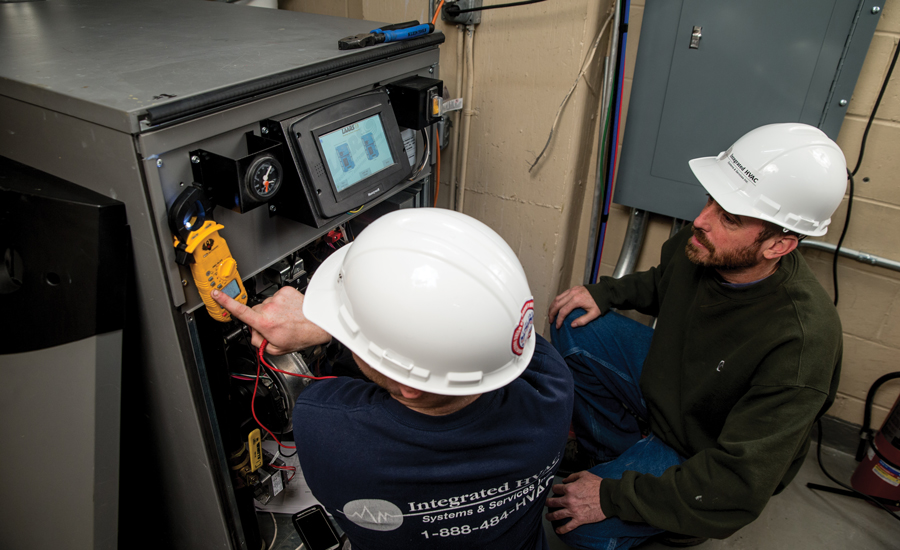 Steven Snyder, mechanic, and Frank Zeires, installation mechanic, at Integrated HVAC Systems and Services. - The NEWS - ACHR