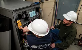 Steven Snyder, mechanic, and Frank Zeires, installation mechanic, at Integrated HVAC Systems and Services. - The NEWS - ACHR
