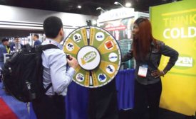 At the Aspen booth, attendees could spin the wheel to receive gift cards, totes, and flashlights. - The ACHR News