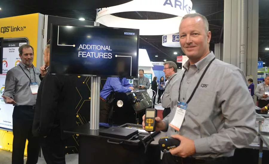 John Jeffers demonstrates the new CPS CC220EW Enhanced Wireless Refrigerant Charging Scale. - The ACHR News