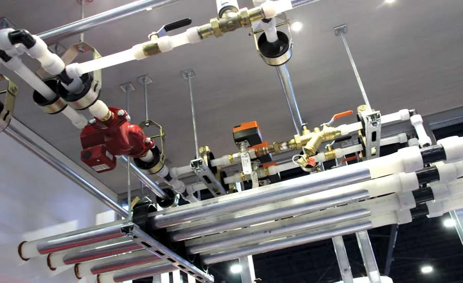 Uponor’s booth featured an aerial display of a radiant system using plastic piping. - The ACHR News