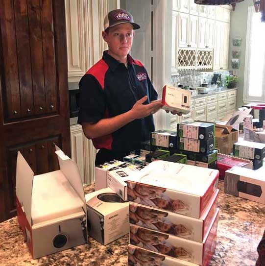 Dustin Neff (pictured) and his father, Keith Neff, found that automation was an obvious fit for their company — Triple A Air Conditioning. - The ACHR News