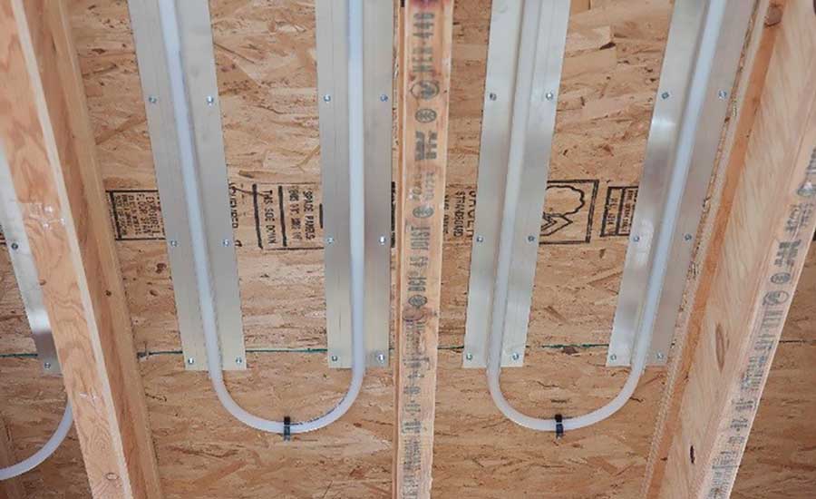Joist Trak is an extruded aluminum heat transfer panel that can be used when an increase to floor height isn’t an option, or when the basement ceiling hasn’t been finished yet. - The ACHR News