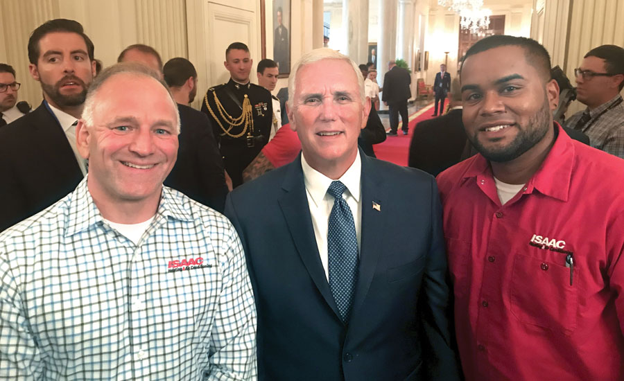 Vice President Mike Pence does some networking for future HVAC needs, flanked by Knaak and Serrano.