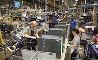 Goodman employees work to manufacture highend equipment.