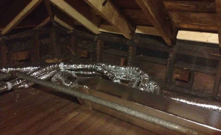 Ductwork inside a kneewall.
