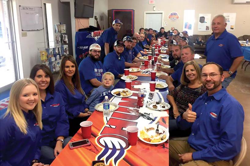 Hunter Super Techs in Ardmore, Oklahoma, celebrates Thanksgiving with a company-wide, family-style dinner.