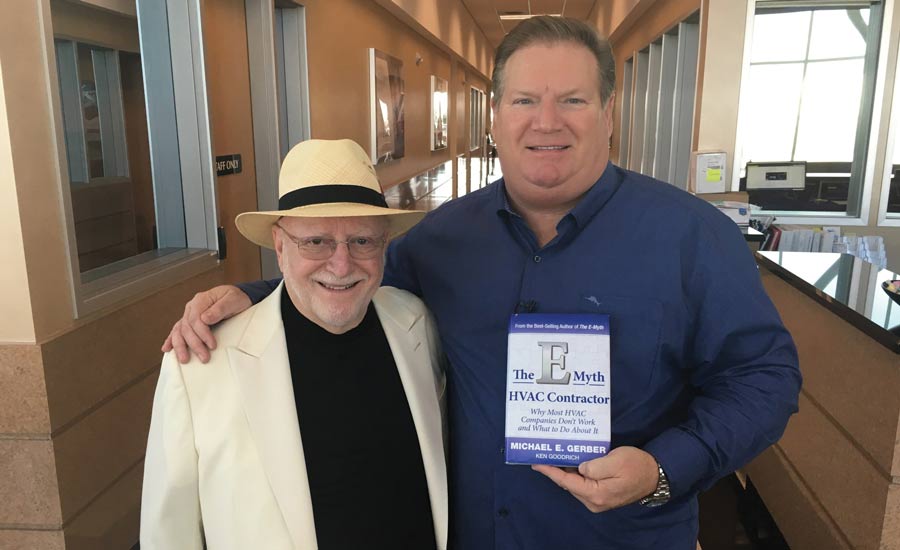 Goettl Air Conditioning & Plumbing CEO Ken Goodrich, at right, poses with co-author Michael E. Gerber to show off this new book “The E-Myth HVAC Contractor” at Service World Expo.