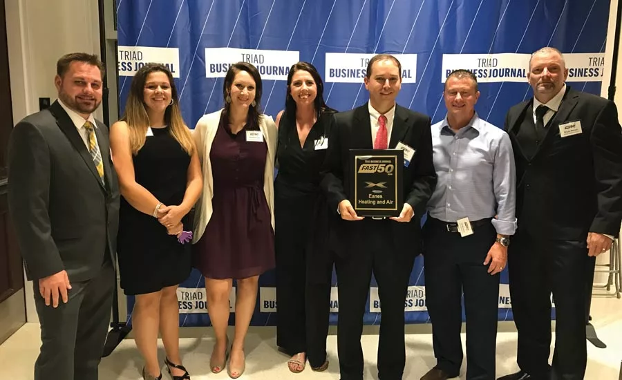 John-Eanes-Accepts-Fast-50-Award.jpg