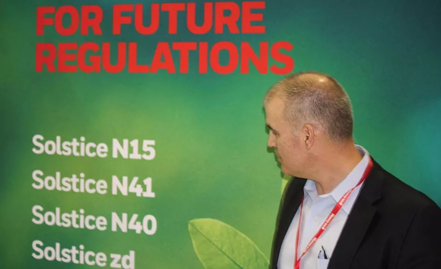 Chris LaPietra, vice president and general manager of Honeywell Stationary Refrigerants, looks over a list of the company’s offerings.