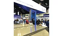 Under the glow of Johnson Controls blue, a busy Tuesday morning at the AHR Expo found the new York Sun Select and Choice rooftop units surrounded on all sides.