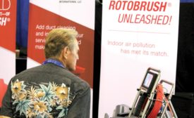 An attendee at the AHR Expo checks out the Rotovision tool.