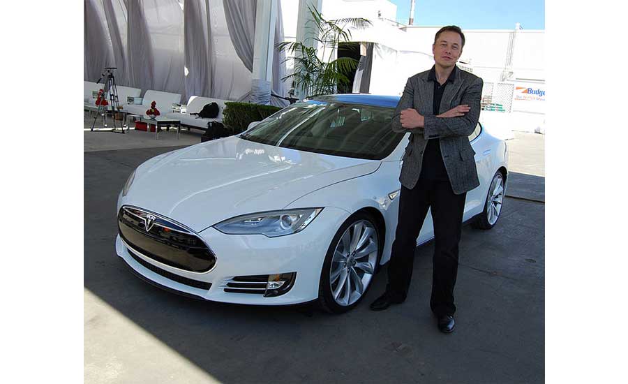 Elon Musk and a Tesla.