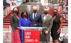 Senate Majority Leader Chuck Schumer, center, poses with members of The Broadway League.