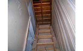 Pull-down ladder for safer service work in attics.