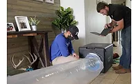 Aeroseal Technicians check to see how leaky a duct system is. Aeroseal products will cover most of the leaks.