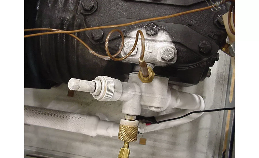 Refrigerant-Cooled Compressor.