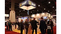 AHR attendees gather at the Yellow Jacket booth.