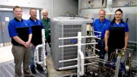 Carrier Engineering Team with Heat Pump