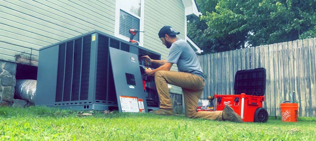 Technician servicing HVAC.