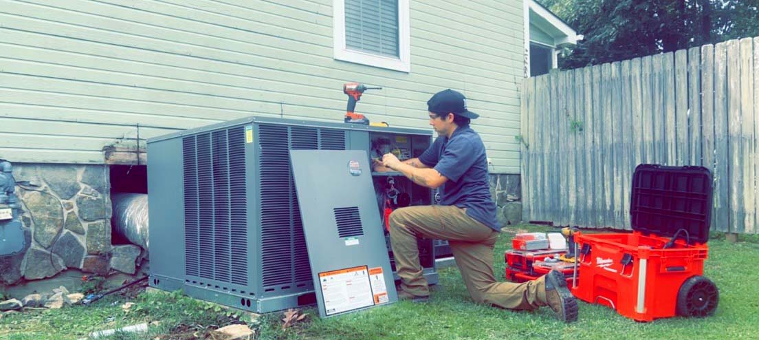 Technician servicing HVAC.