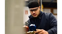Student Working On Air Conditioner