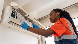 Woman Installing HVAC