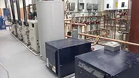 Hybrid water-to-water and water-to-air geothermal system