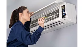 Woman and HVAC Unit