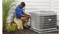 Carrier-Tech-Installing-High-Efficiency-Heat-Pump.jpg Carrier-Tech-Installing-High-Efficiency-Heat-Pump.jpg