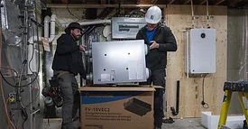 Contractors Unboxing HVAC Unit