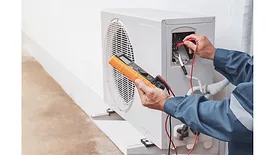 technician-working-on-heat-pump.jpg