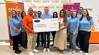 Carrier check presentation to Feeding America