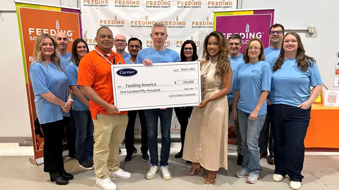 Carrier check presentation to Feeding America