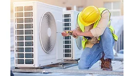 hvac-technician-working-on-heat-pump.jpg