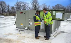 METUS Technicians with HVAC Unit