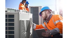 HVAC-techs-with-rooftop-unit.jpg