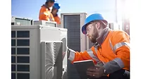 HVAC techs with rooftop unit.jpg HVAC-techs-with-rooftop-unit.jpg